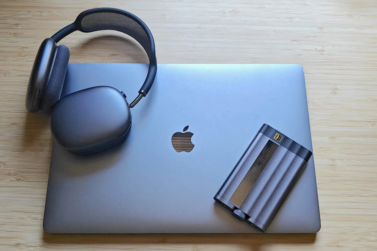 Apple headphones connected to a Windows PC with wired and Bluetooth options