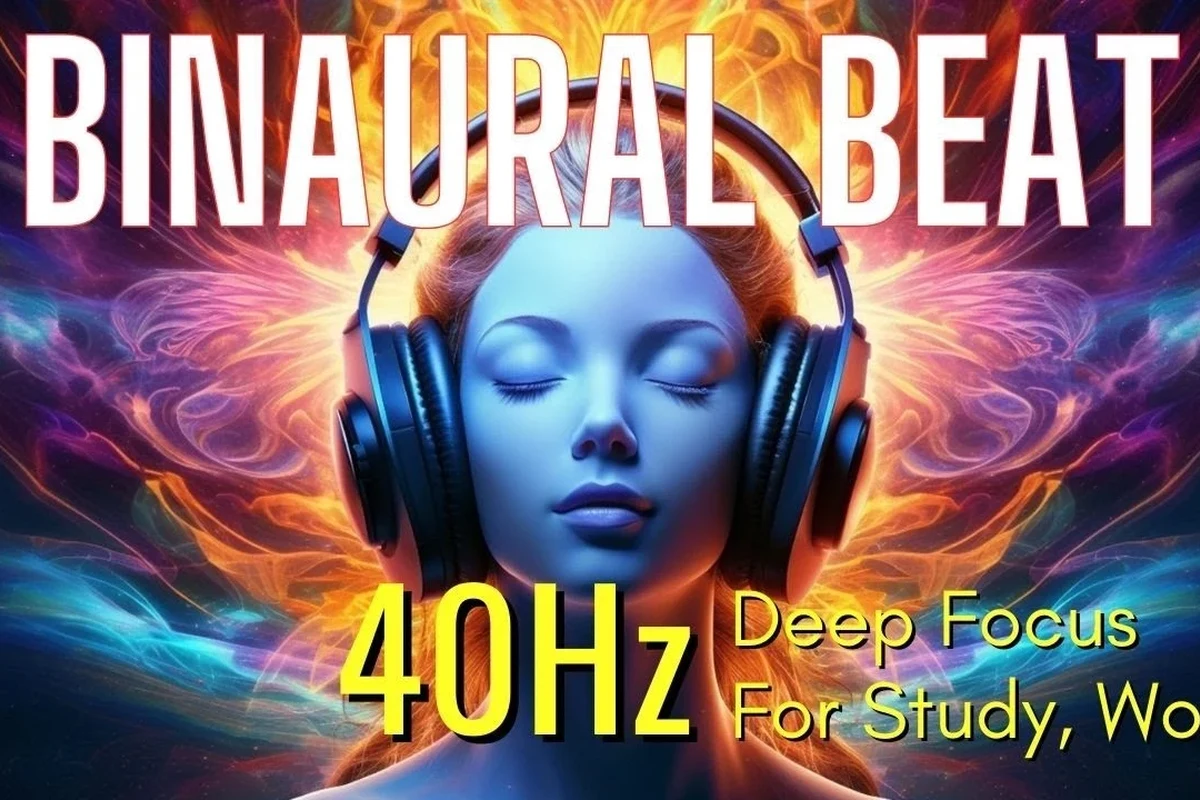 Person listening to binaural beats on over-ear headphones in a quiet room