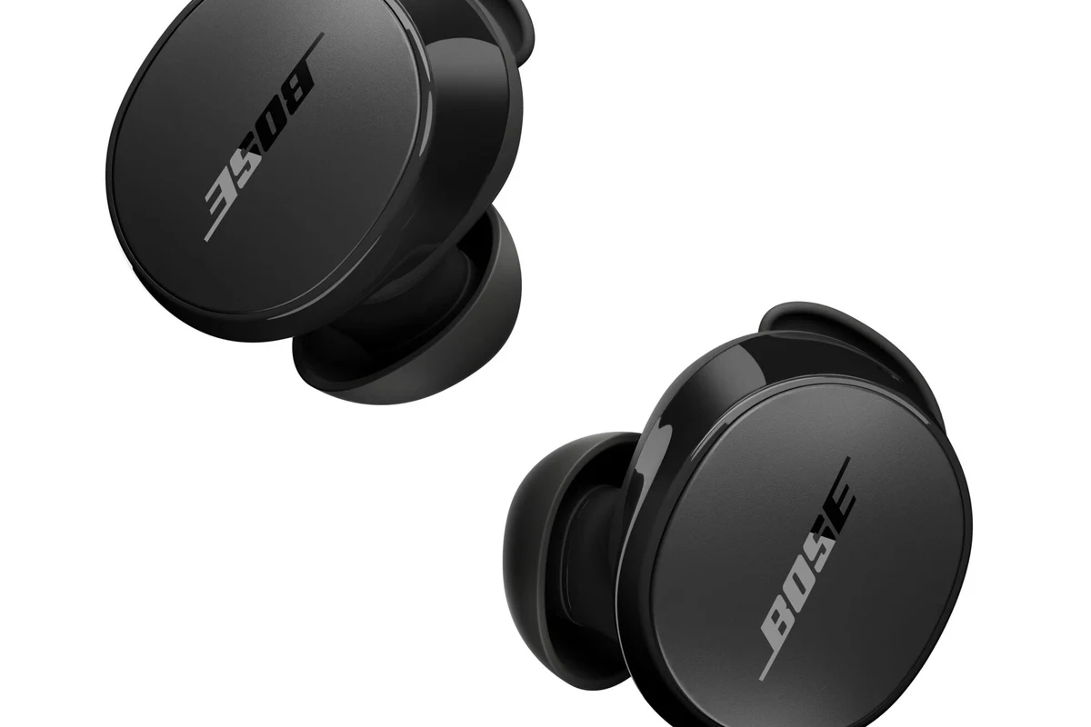 Bluetooth headphones connected to a PS4 console with a wireless adapter and controller