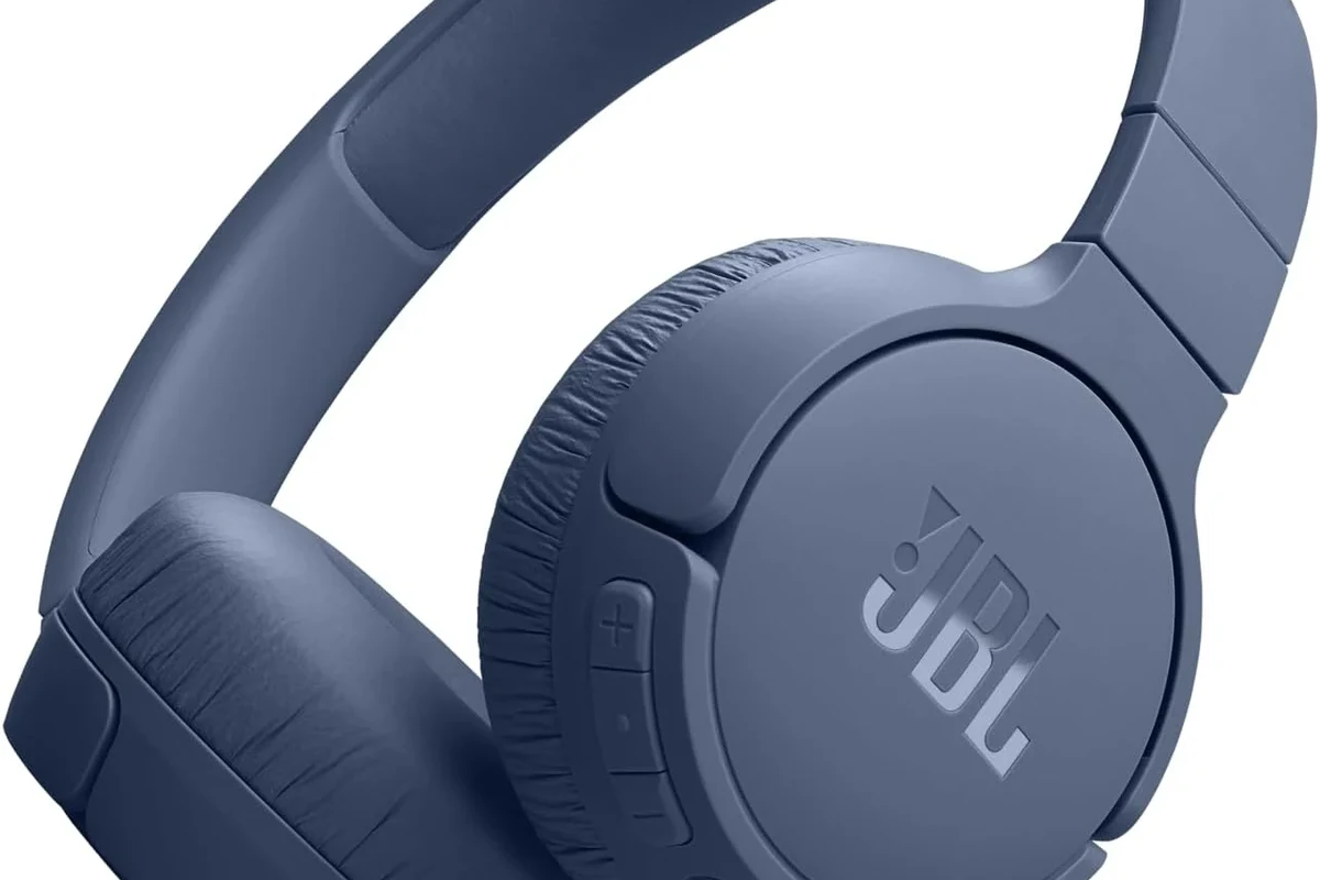 Bluetooth headphones connected to a PS5 using a wireless adapter setup