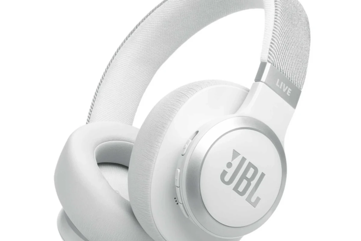 Person using Bluetooth headphones with a smart TV for wireless audio