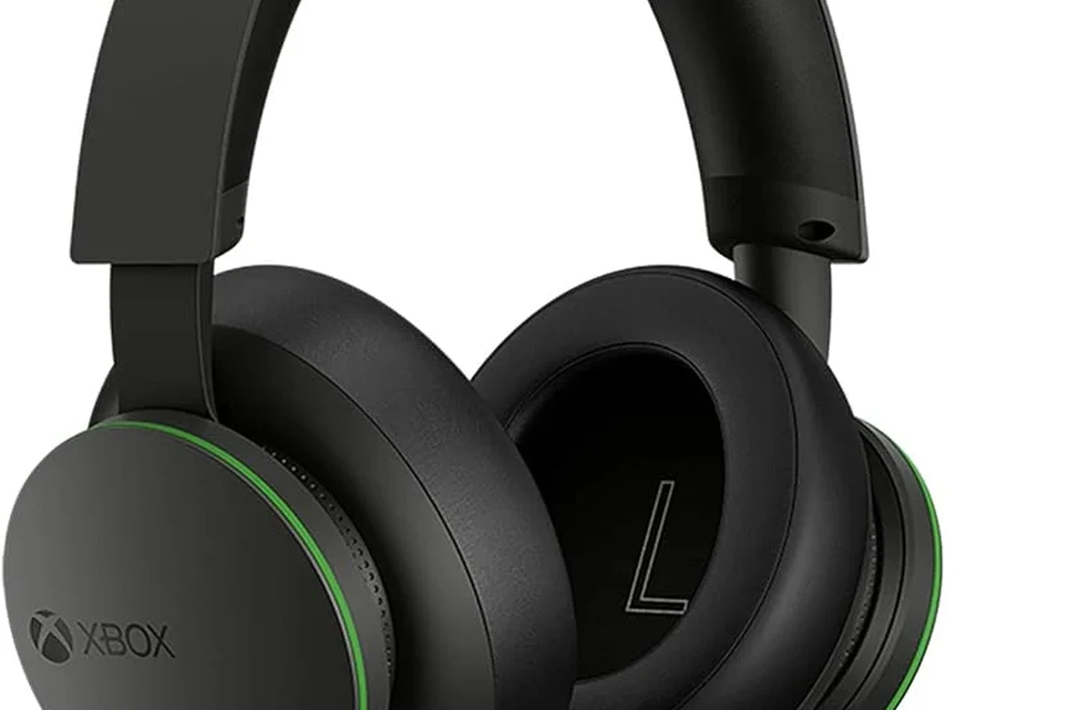 Headphones connected to an Xbox setup using wireless and Bluetooth workaround methods