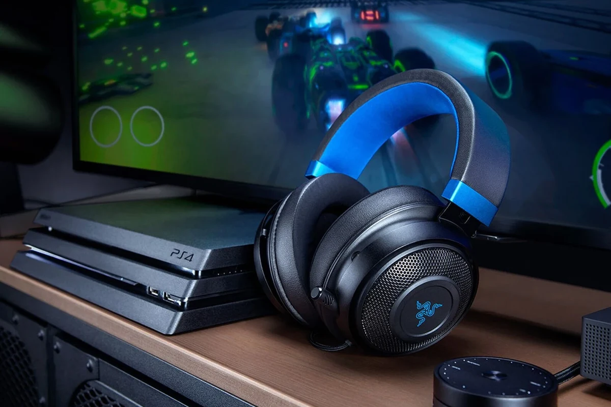 Wireless gaming headset connected to a PS4 console with USB dongle