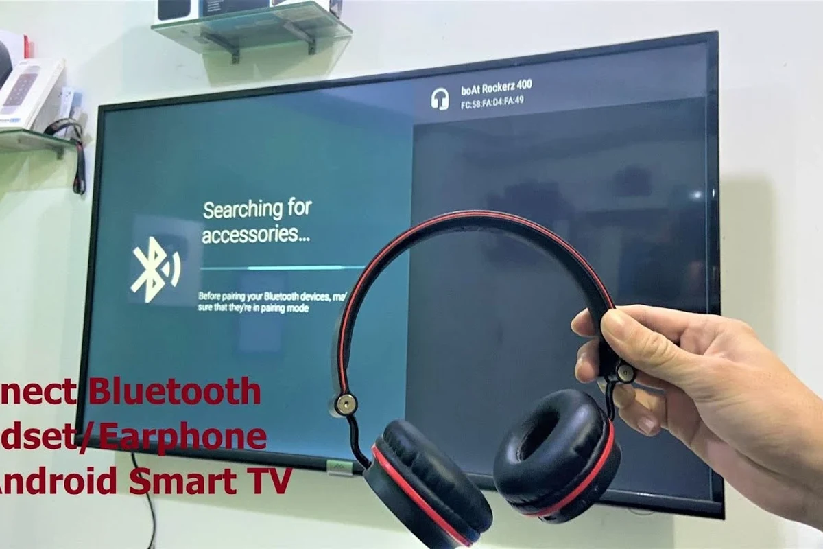 Wireless headphones paired to a TV in a modern living room setup