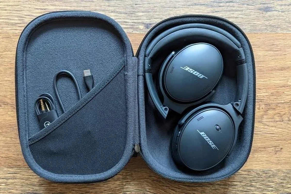 Bose over-ear headphones folded neatly into a protective carrying case