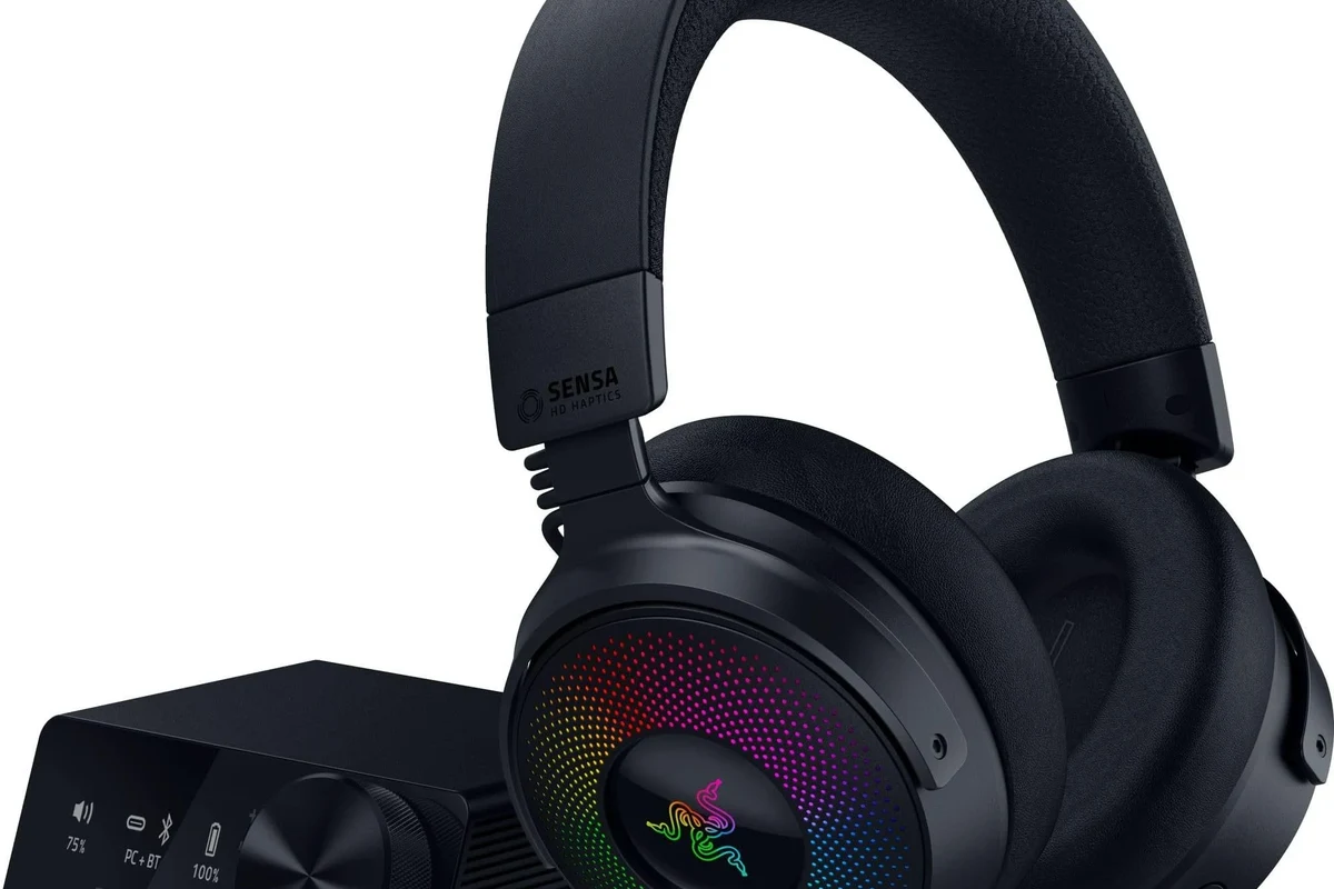 Person connecting TV to headphones with Bluetooth and wired audio options shown
