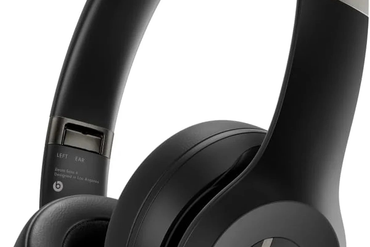 Beats headphones repair options with technician tools and replacement ear pads