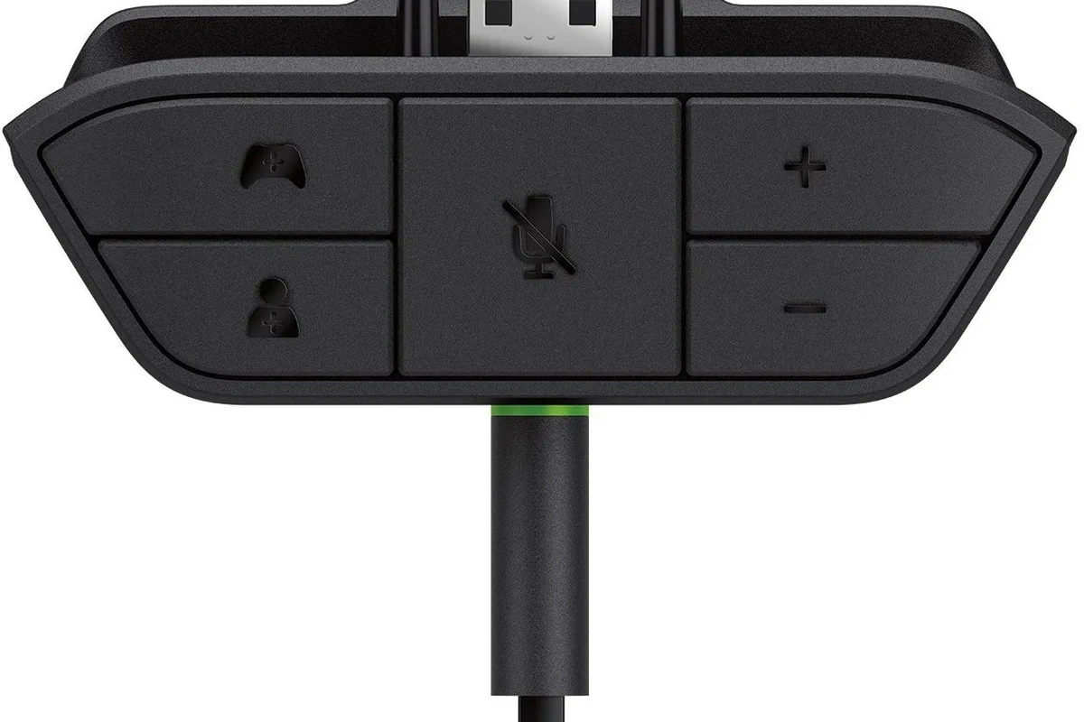 Xbox controller with wired headphones connected for gaming audio setup