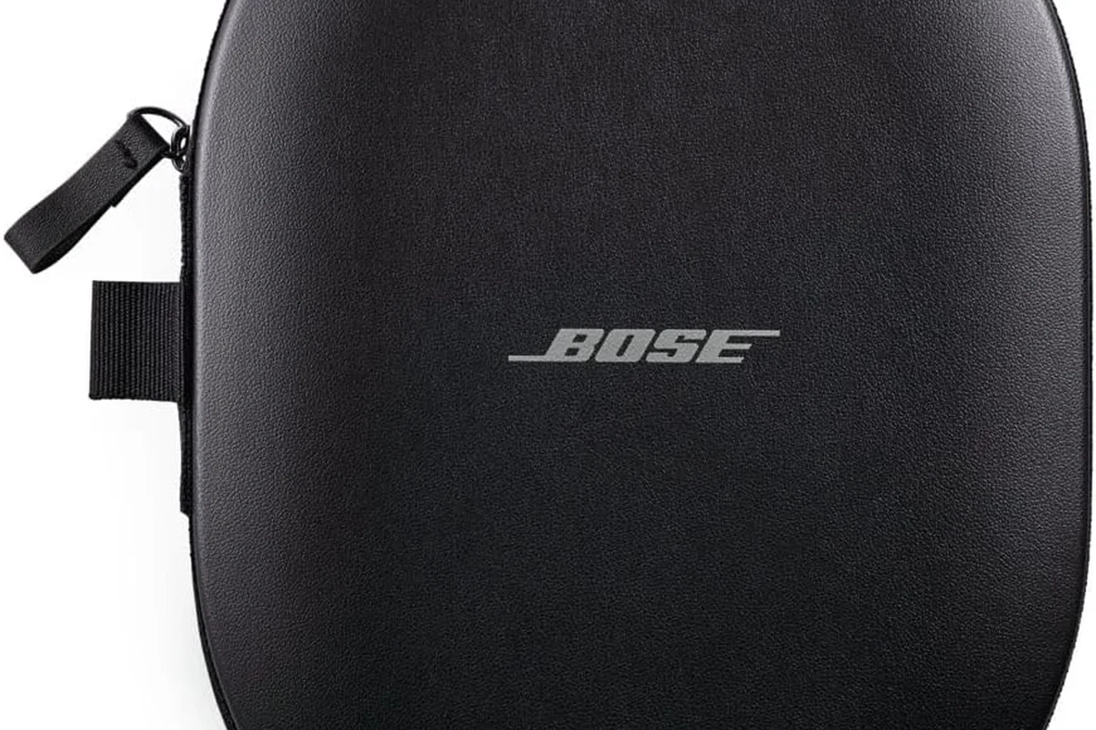Bose over-ear headphones placed correctly inside a protective travel case