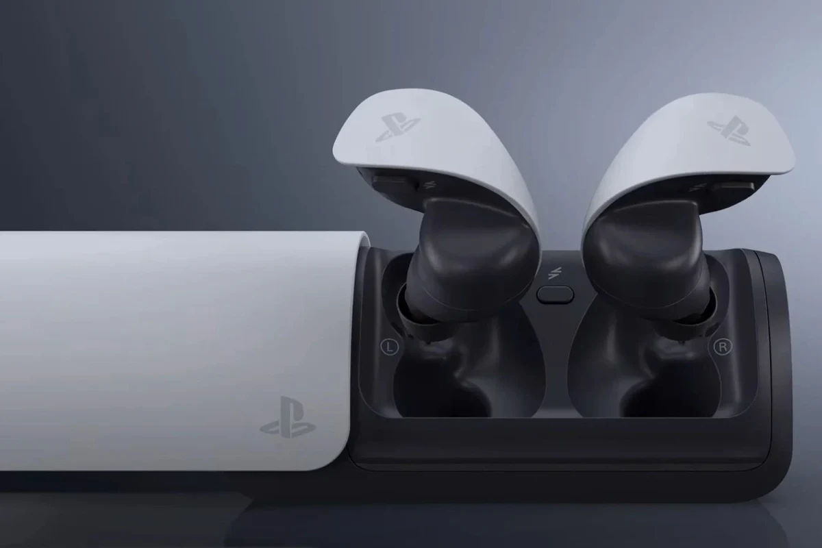 Sony headphones connected to a PS5 console with controller and gaming setup
