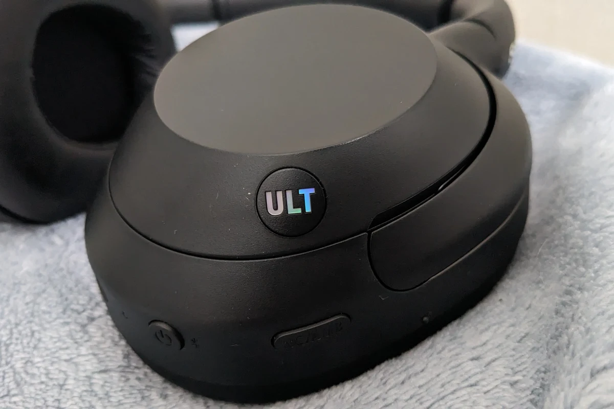Sony headphones with a highlighted Ult button for bass boost mode