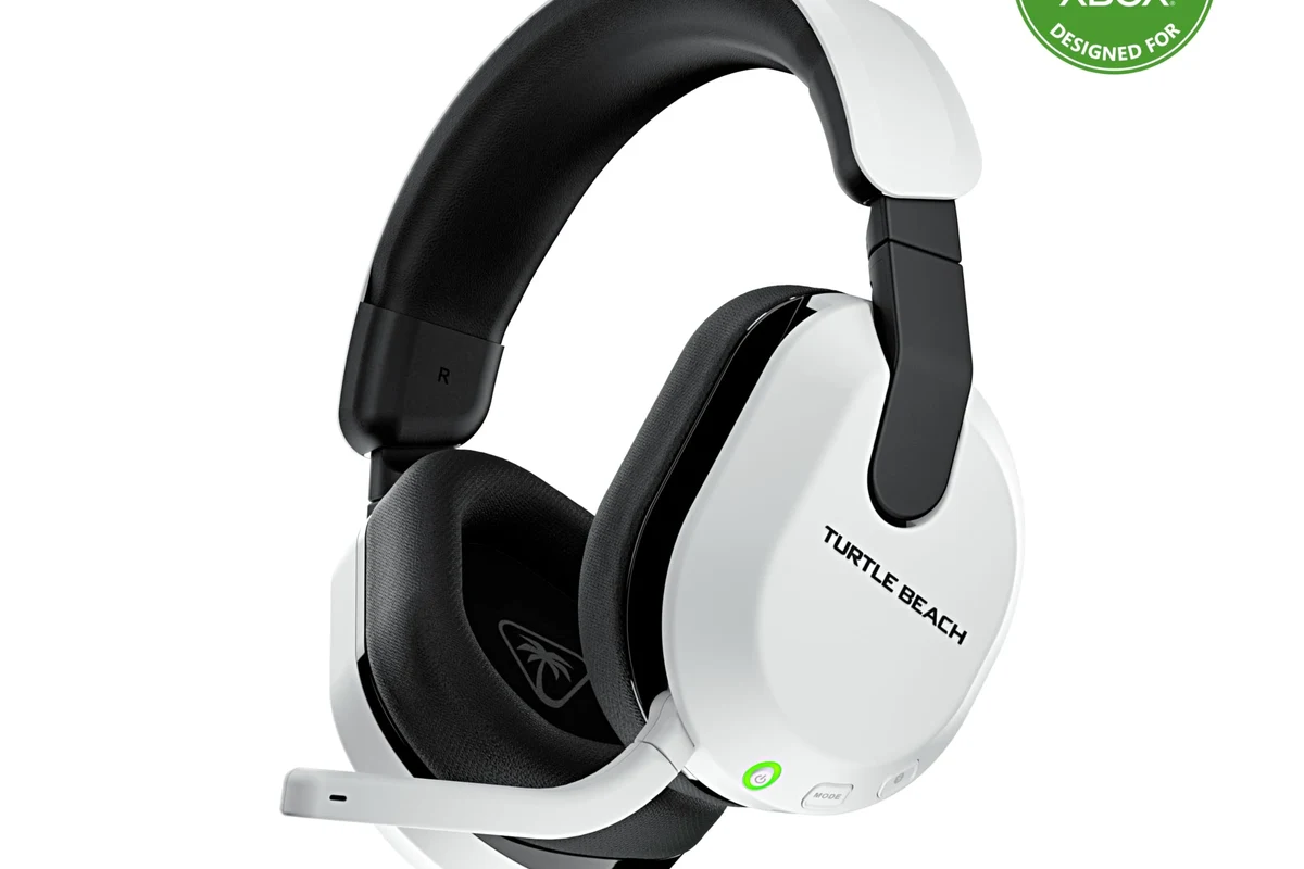 Xbox Series X with wireless headphones and controller on a gaming desk