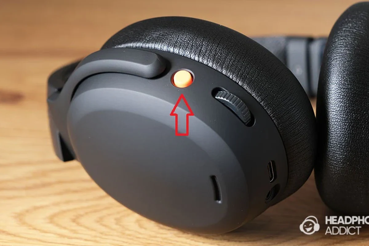 Person pairing and using Skullcandy headphones with phone, charging case, and Bluetooth controls