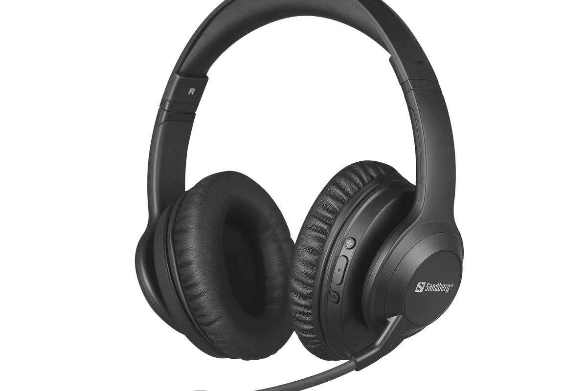 Wireless headphones connected to a PS4 console with controller and USB dongle