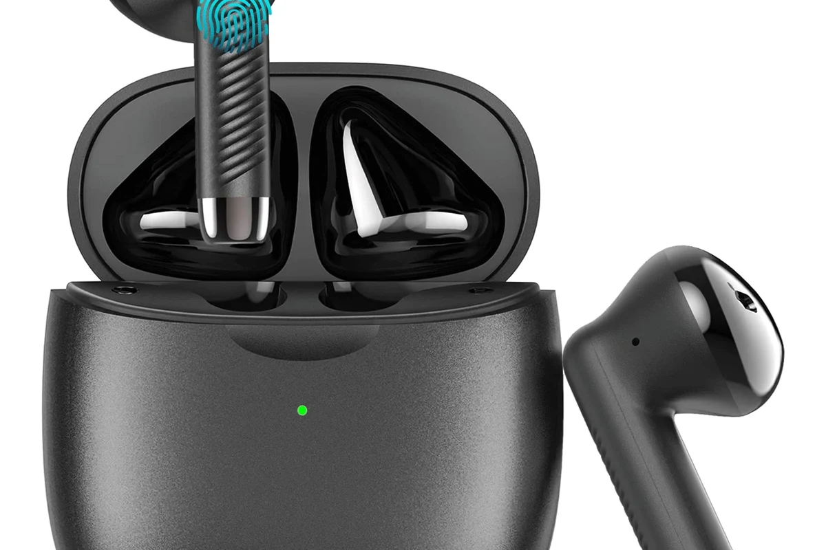 Wireless headphones connected to a TV for private listening in a living room