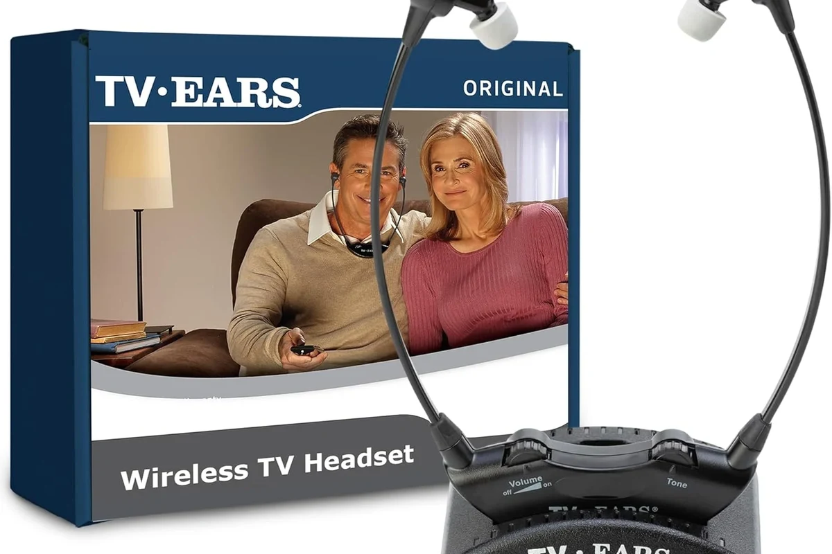Wireless headphones connected to a TV for private listening in a living room