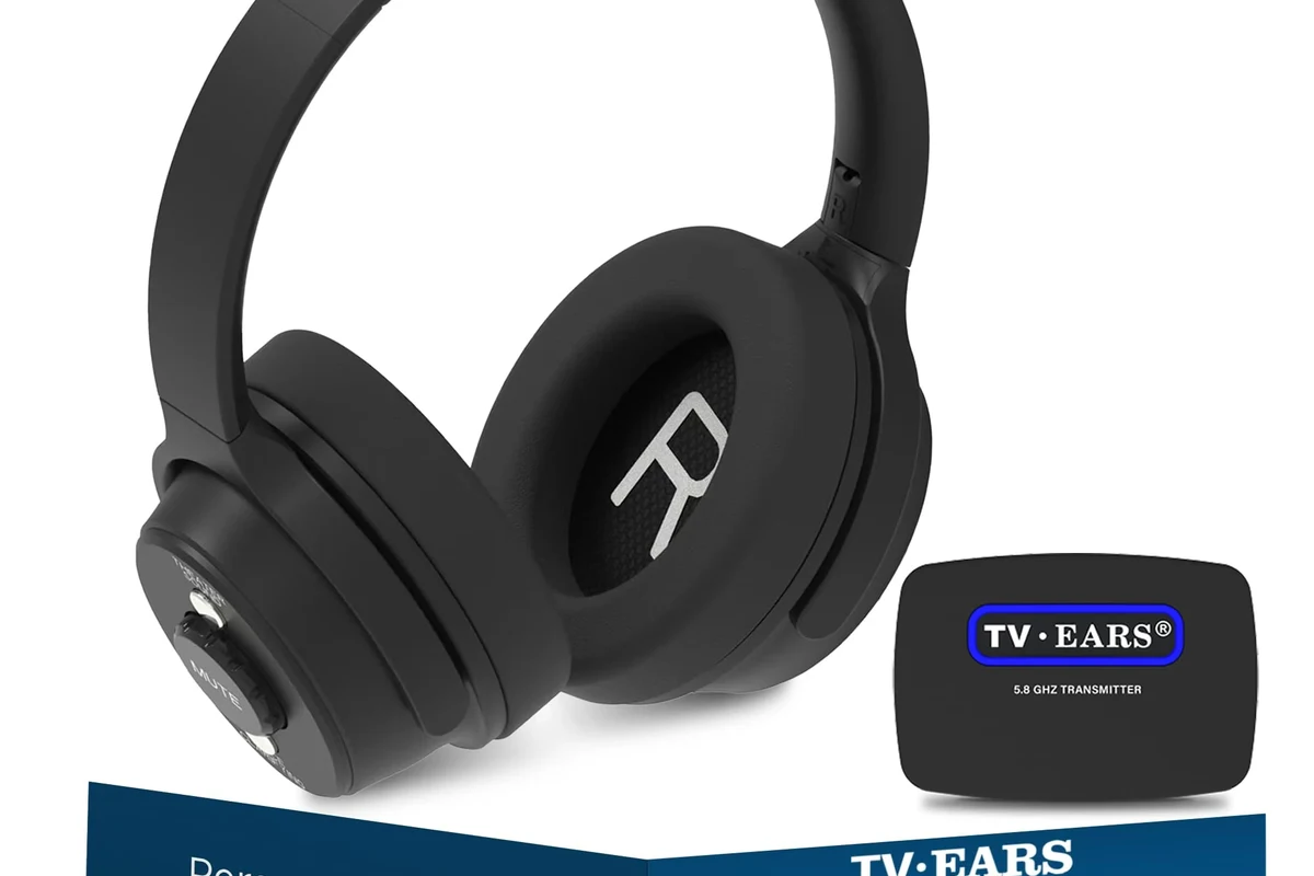 Person connecting headphones to a TV for private movie and gaming audio
