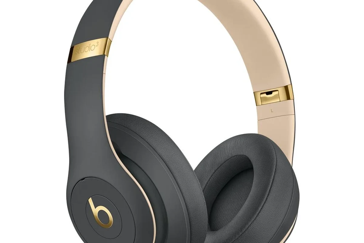 Beginner using Beats headphones with Bluetooth pairing, playback controls, and travel use