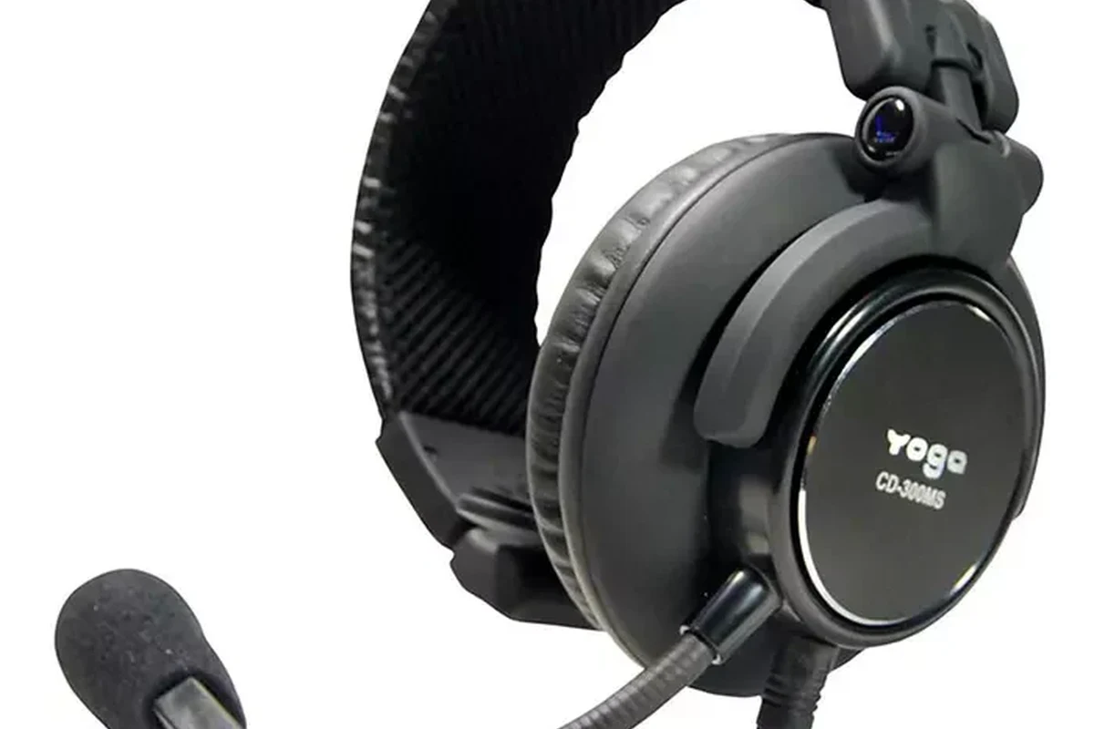 Wireless over-ear headphones with built-in microphone on a clean desk setup