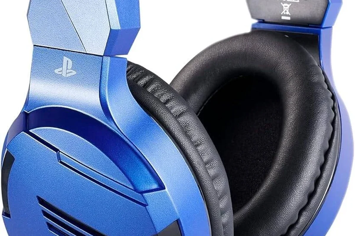 PS4 gaming headset on a clean desk with controller and console setup